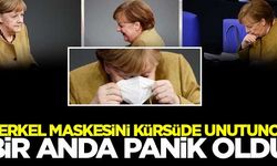 Merkel maskesini kürsüde unutunca bir anda panik oldu